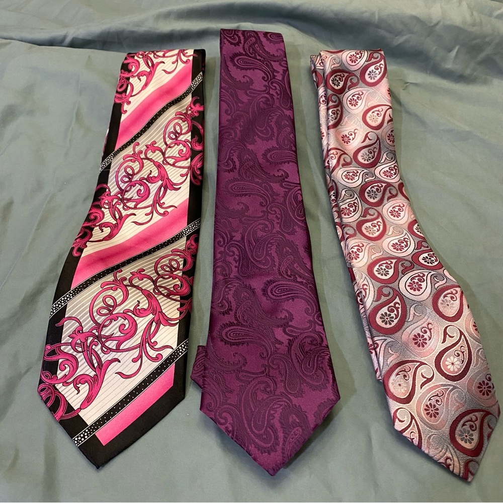 Shades of pink and purple ties.  All are 60” long
